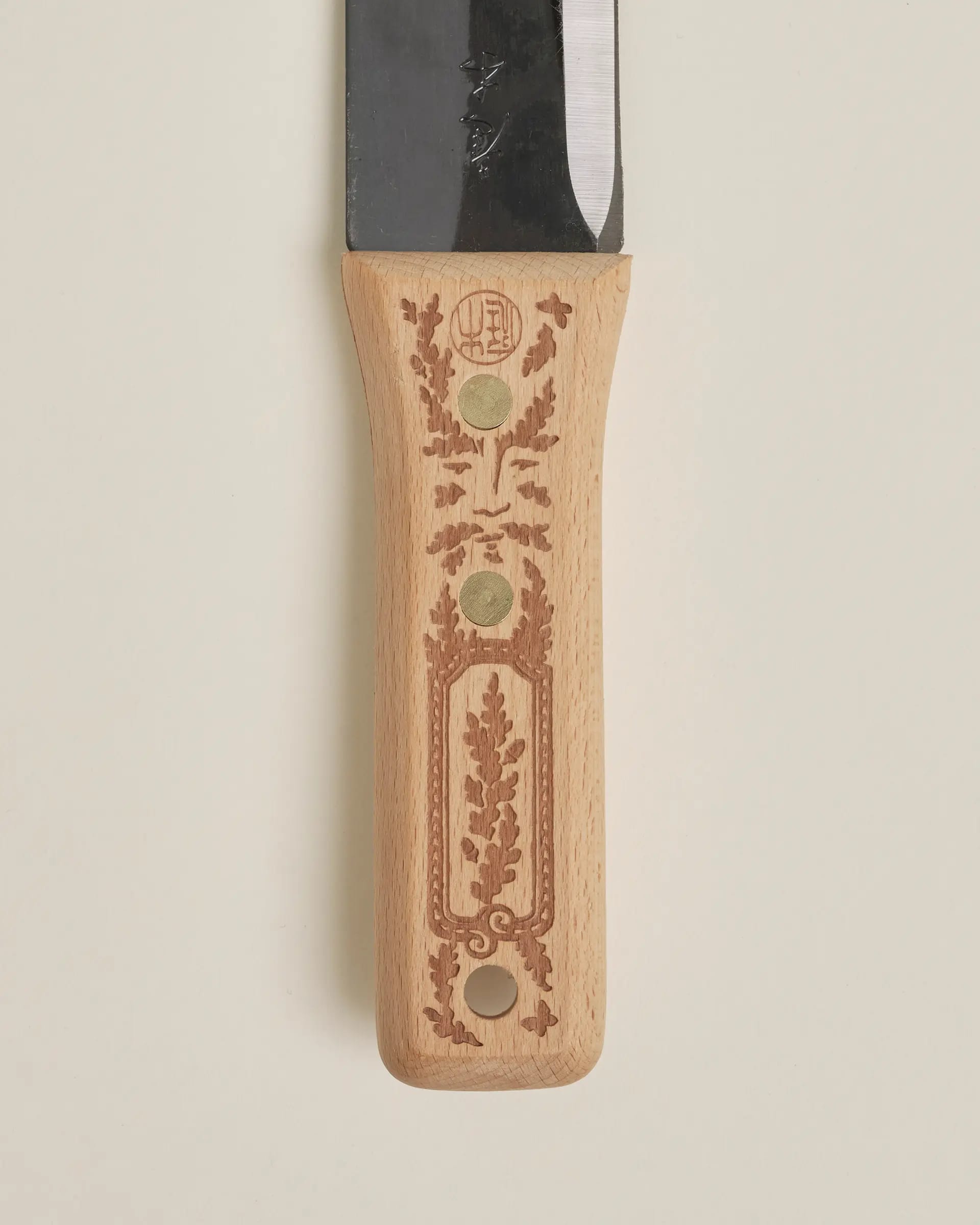 Engraved beech handle