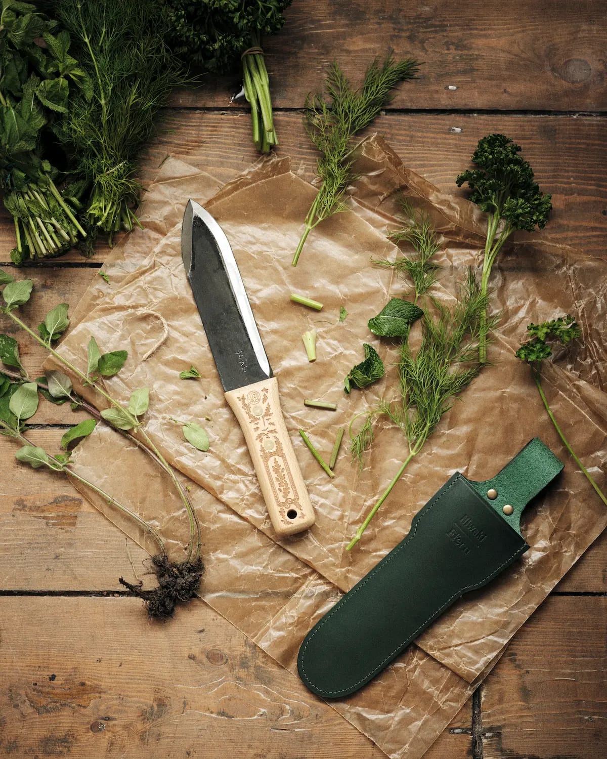 The knife in use among cut herbs